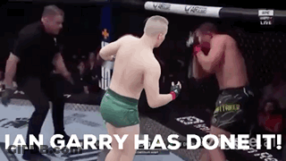 Two Men Fighting In Boxing Ring Ian Garry Has Done It GIF