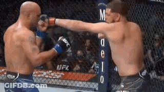Two Men Fighting In Boxing Ring GIF