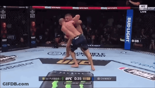 Two Men Fighting In Boxing Ring GIF