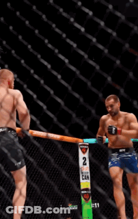 Two Men Fighting In Boxing Ring Saying 2 GIF