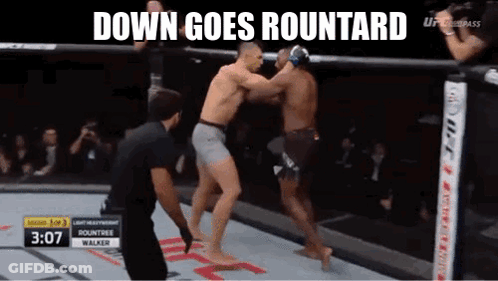 Two Men Fighting In Boxing Ring Saying Down Goes Roundard GIF