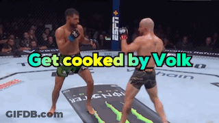 Two Men Fighting In Boxing Ring Saying Get Cooked By Volks GIF