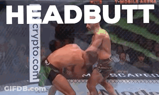 Two Men Fighting In Boxing Ring Saying Headbutt GIF