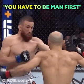 Two Men Fighting In Boxing Ring Saying You Have To Be Man First GIF