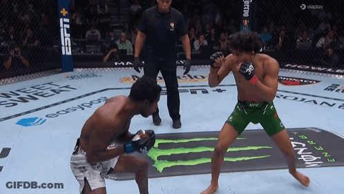 Two Men Fighting In Boxing Ring Sponsored By ESPN And Monster GIF