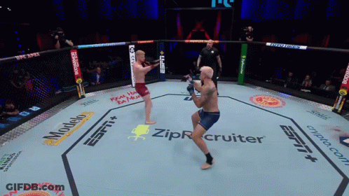 Two Men Fighting In Boxing Ring Sponsored By ZipRecruiter And Modelo GIF
