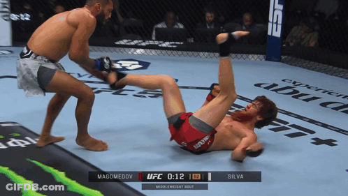 Two Men Fighting In Boxing Ring UFC On ESPN GIF