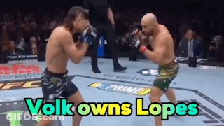Two Men Fighting In Boxing Ring Volks Owns Lopes GIF