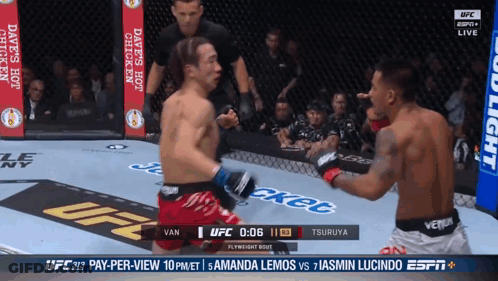 Two Men Fighting In Boxing Ring GIF