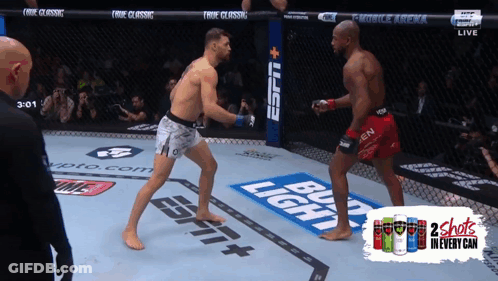 Two Men Fighting In Boxing Ring With Bud Light GIF