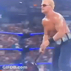 Two Men Fighting In Boxing Ring With Crowd GIF