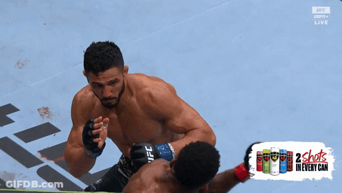 Two Men Fighting In Boxing Ring With Energy Drink GIF
