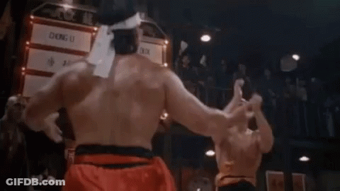 Two Men Fighting In Boxing Ring With Flame GIF
