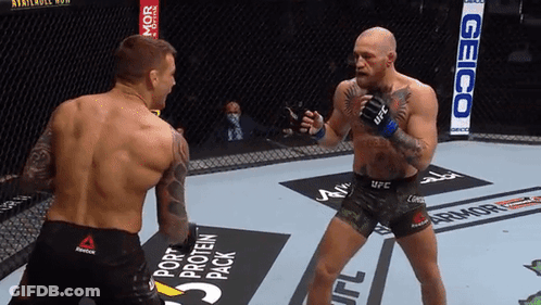 Two Men Fighting In Boxing Ring With Geico Sign GIF
