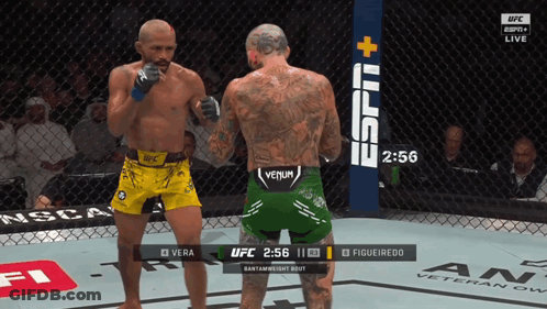 Two Men Fighting In Boxing Ring With Manscaped Banner GIF