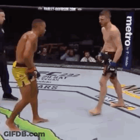 Two Men Fighting In Boxing Ring With Metro Sign GIF