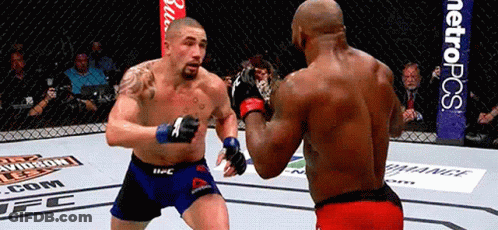 Two Men Fighting In Boxing Ring With Metropcs GIF