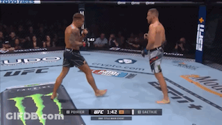 Two Men Fighting In Boxing Ring With Monster Energy Drink GIF