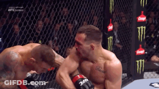 Two Men Fighting In Boxing Ring With Monster Energy Sign GIF