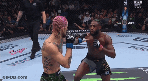 Two Men Fighting In Boxing Ring With Number 30 Shirt GIF