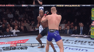 Two Men Fighting In Boxing Ring With Rizz Pharma GIF