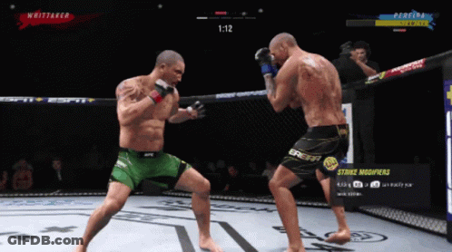 Two Men Fighting In Boxing Ring With Strike Modifiers Button GIF