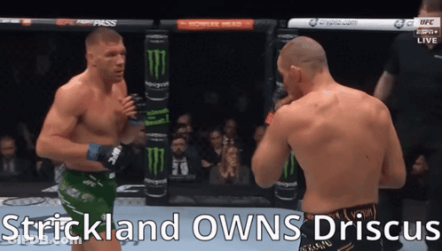 Two Men Fighting In Boxing Ring GIF