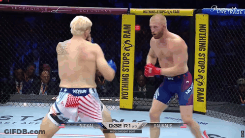 Two Men Fighting In Cage Nothing Stops Ram GIF