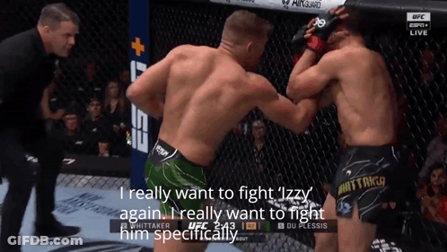 Two Men Fighting In Cage Want To Fight Izzy Again GIF
