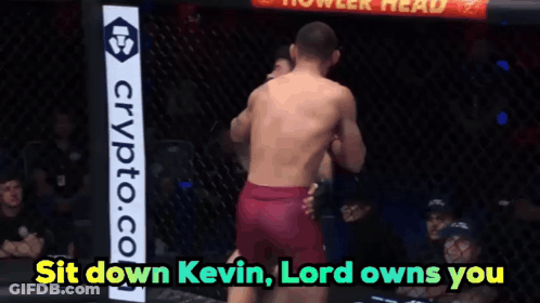 Two Men Fighting In Cage With Crypto.com Sign GIF