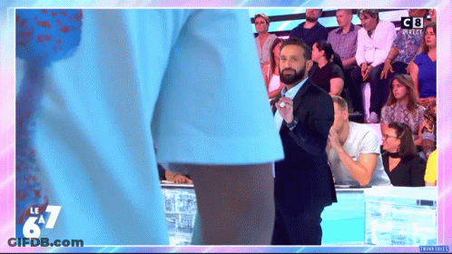 Two Men Fighting In Cage With Toyota Banner GIF