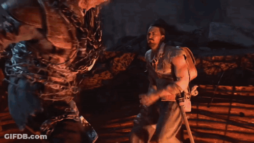 Two Men Fighting In Dark Room GIF