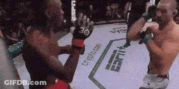Two Men Fighting In Ring Crypto.com GIF