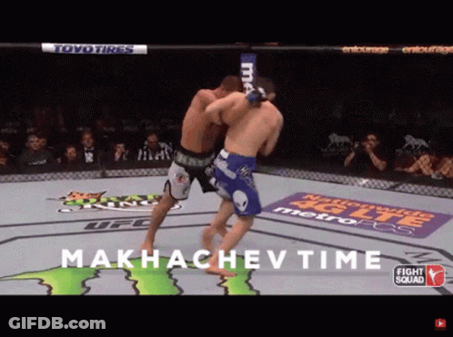 Two Men Fighting In Ring Makhachev Time GIF