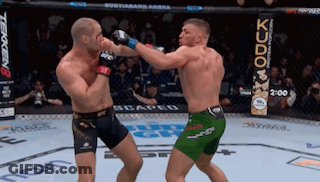 Two Men Fighting In Ring Strickland Won GIF