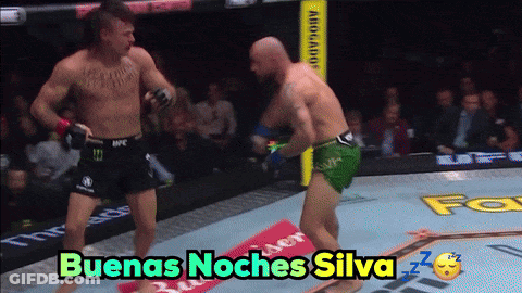 Two Men Fighting In Ring With Buenas Noches Silva GIF