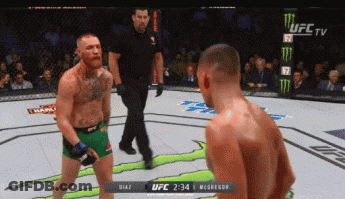 Two Men Fighting In UFC Ring GIF