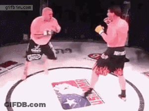 Two Men Fighting In UFC Ring GIF