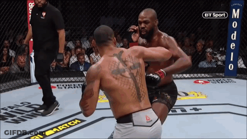 Two Men Fighting In UFC Ring GIF