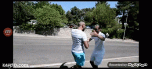 Two Men Fighting Recorded On Phone GIF