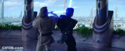 Two Men Fighting With Lightsabers GIF