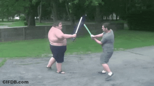 Two Men Fighting With Lightsabers GIF