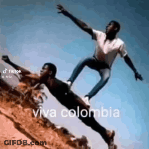 Two Men Flying Viva Colombia GIF