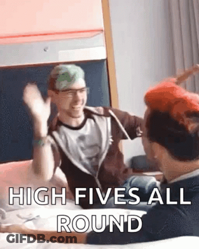 Two Men Giving Each Other A High Five GIF