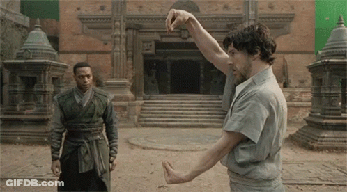 Two Men Hand Gesture Outside Building GIF