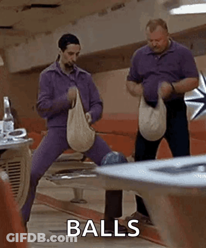 Two Men Holding Bags In Bowling Alley GIF