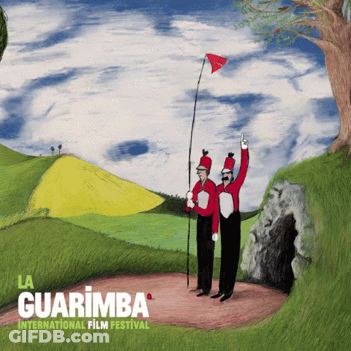 Two Men Holding Flags At La Guarimba International Film Festival GIF