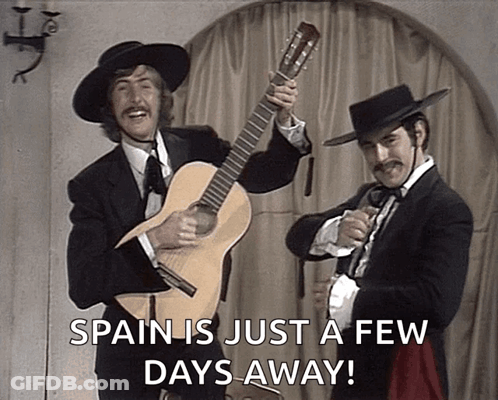 Two Men Holding Guitars Spain Just Days Away GIF