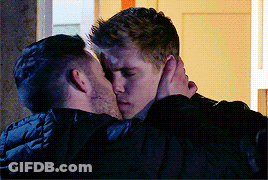 Two Men Hugging And Kissing GIF