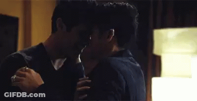 Two Men Hugging And Kissing GIF
